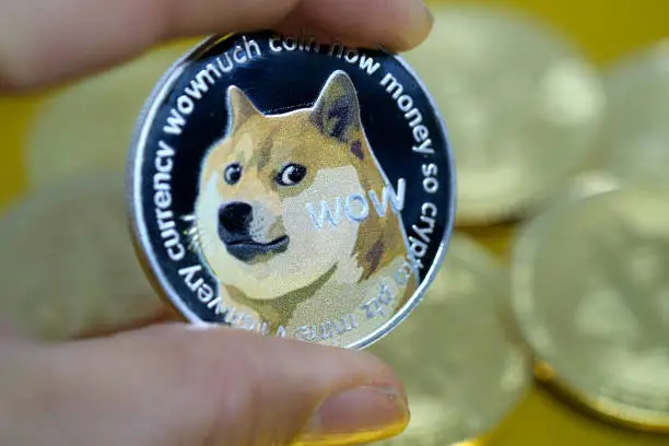 Dogecoin’s Price Coils In A Key Bullish Chart Pattern, A Rebound On The Horizon?
